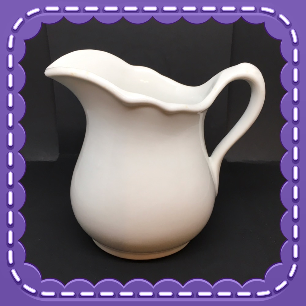 White Ceramic Pitcher